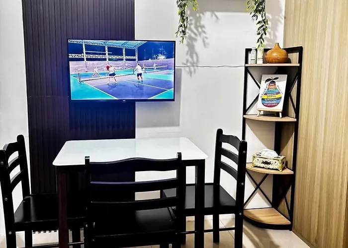 Отель Sly Staycation At Shore Residences Mall Of